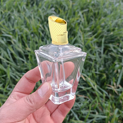 Buy Abu Dhabi National Exhibition Centre Shape Zamac Perfume Cap with bottle online manufacture