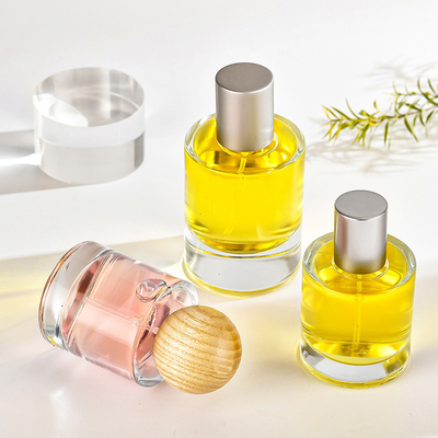 Buy Perfume Glass Bottle 30ml 50ml Bayonet Cylinder Transparent Perfume Subpackage Cosmetics Spray Bottle With Wooden Cover online manufacture