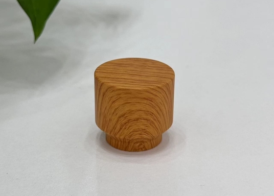 Buy Custom Wooden Zamak Perfume Caps For Sophisticated Fragrance Packaging online manufacture