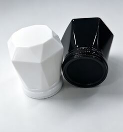 Buy Diamond-Cut Zamak Perfume Cap with Multi-Faceted Geometric Design and Customizable Finishes online manufacture